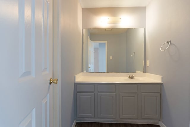 bathroom featuring vanity and baseboards