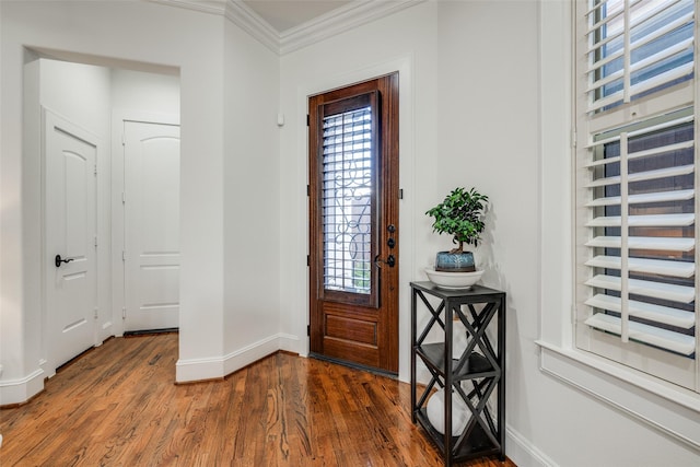 entryway with baseboards, dark wood-style flooring, and crown molding