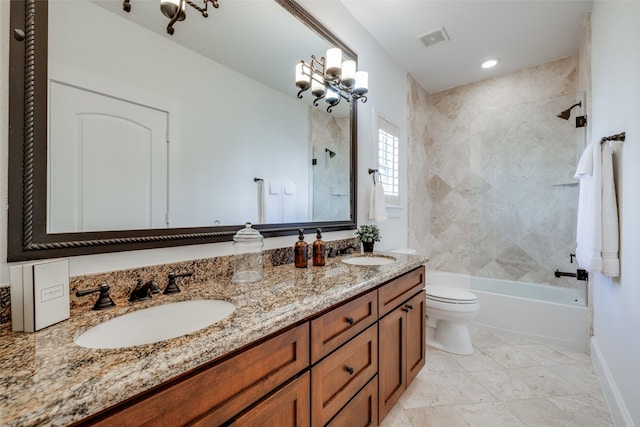 full bath featuring toilet,  shower combination, a sink, and visible vents