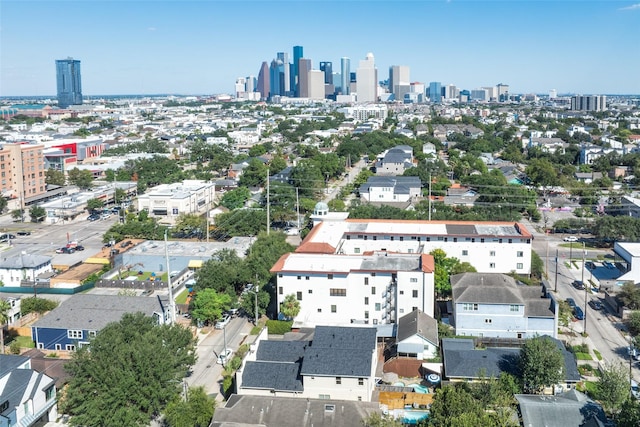 birds eye view of property with a city view