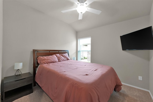 bedroom featuring vaulted ceiling, carpet floors, ceiling fan, and baseboards