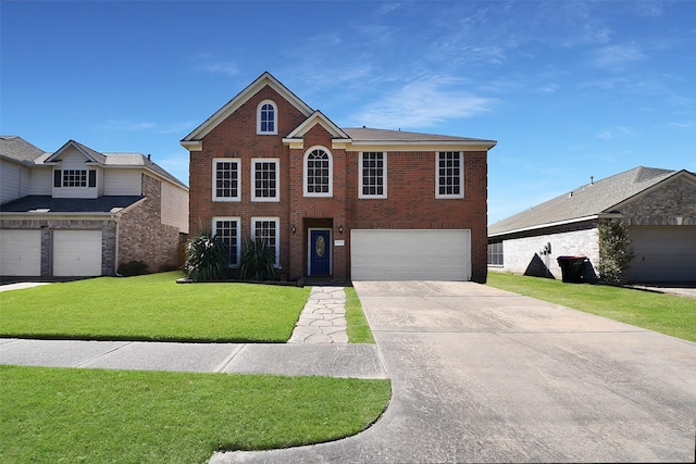 view of front of house with brick siding, driveway, a front lawn, and a garage