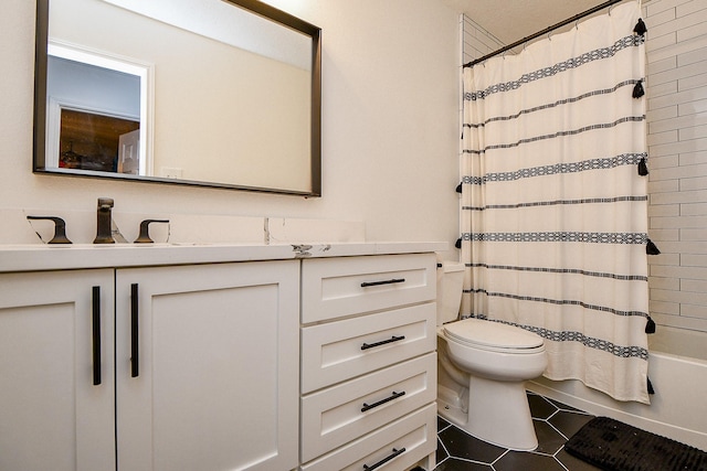 full bathroom with vanity, tile patterned floors, toilet, and shower / bath combo