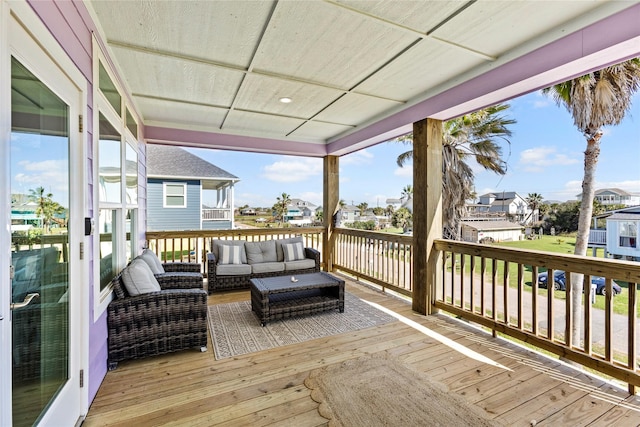 deck with a residential view and an outdoor living space