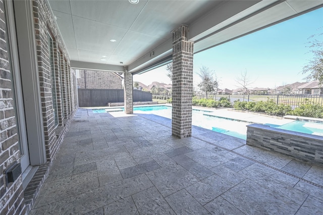 view of patio with a fenced in pool and a fenced backyard