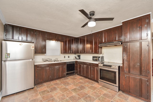 kitchen with appliances with stainless steel finishes, light countertops, dark brown cabinetry, and under cabinet range hood