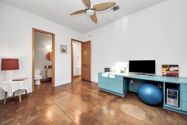 office area featuring visible vents, baseboards, finished concrete flooring, and a ceiling fan