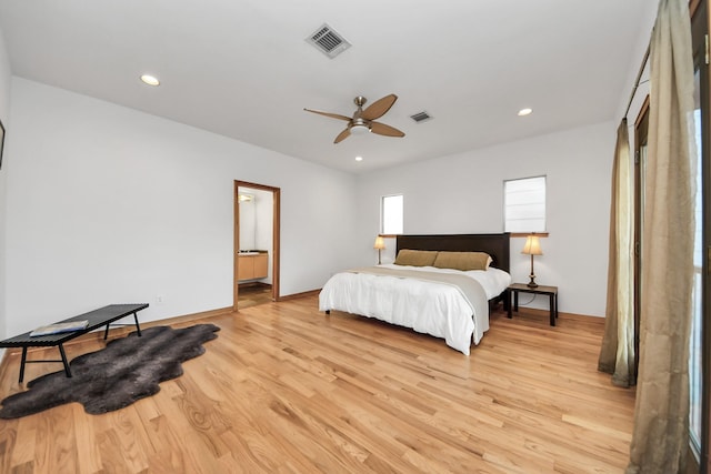 bedroom featuring recessed lighting, visible vents, light wood finished floors, and baseboards