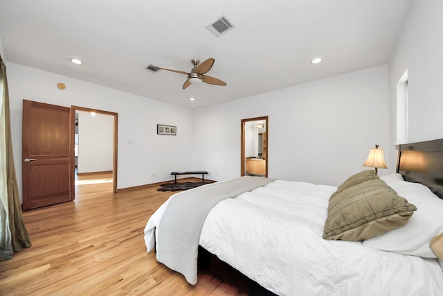 bedroom with light wood-style flooring, recessed lighting, and visible vents