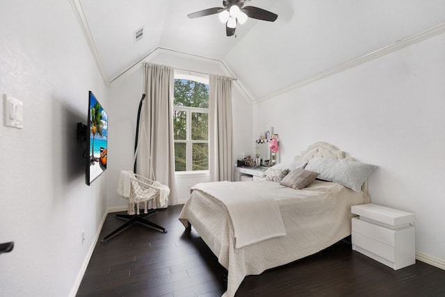 bedroom with vaulted ceiling, dark wood-style floors, visible vents, and ornamental molding