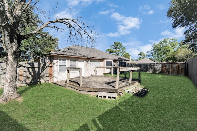 view of yard with a fenced backyard and a wooden deck