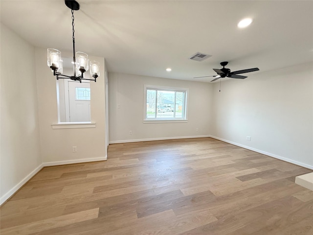 spare room featuring recessed lighting, baseboards, visible vents, and light wood finished floors