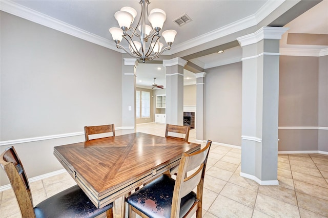 dining area featuring decorative columns, a fireplace, light tile patterned floors, visible vents, and ceiling fan with notable chandelier