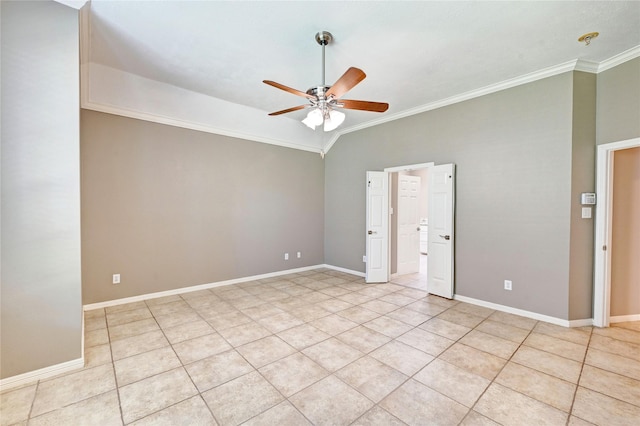 spare room featuring ceiling fan, ornamental molding, and baseboards