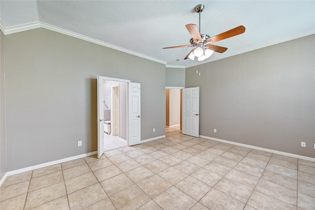 empty room with ceiling fan, lofted ceiling, light tile patterned flooring, baseboards, and crown molding