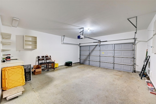 garage featuring baseboards and a garage door opener