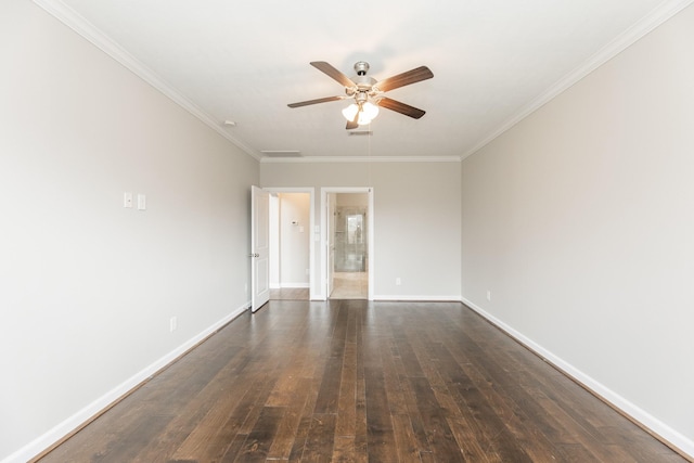 spare room featuring dark wood-style floors, ceiling fan, baseboards, and ornamental molding