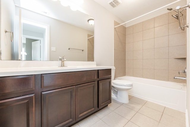 bathroom featuring vanity, visible vents, shower / bathing tub combination, tile patterned floors, and toilet