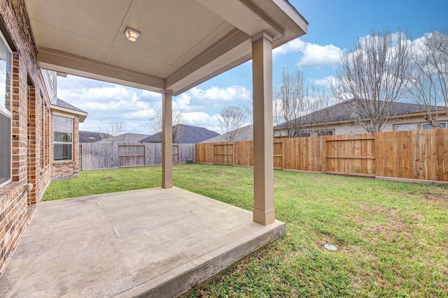 view of yard with a patio and a fenced backyard