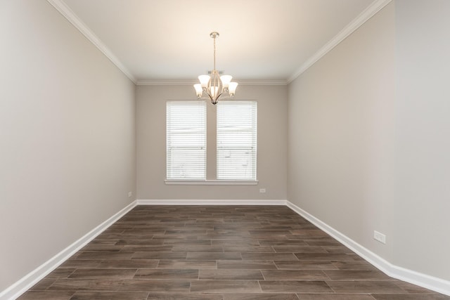 unfurnished room featuring dark wood finished floors, a notable chandelier, baseboards, and ornamental molding