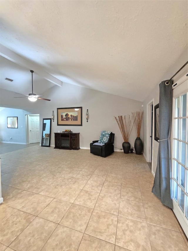 unfurnished living room featuring light tile patterned floors, baseboards, visible vents, vaulted ceiling with beams, and a textured ceiling