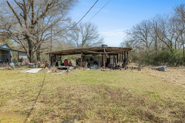 view of yard with an outbuilding and an outdoor structure