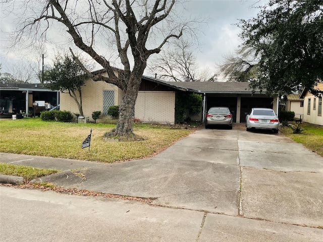 mid-century inspired home featuring concrete driveway, brick siding, an attached garage, and a front lawn