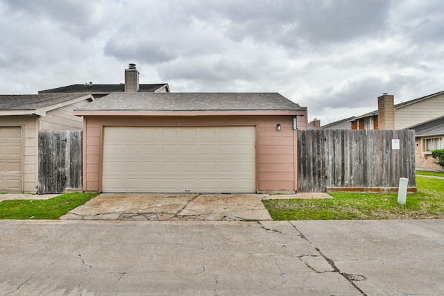 detached garage with fence