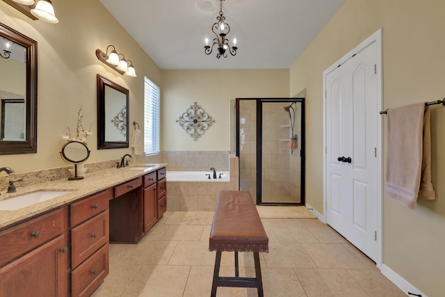 full bathroom featuring a stall shower, a garden tub, a sink, and tile patterned floors