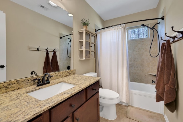 bathroom featuring visible vents, toilet, shower / tub combo with curtain, tile patterned flooring, and vanity