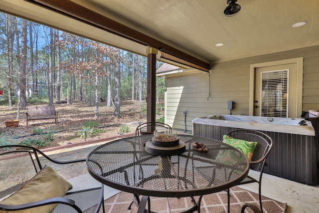 view of patio / terrace with central AC unit and outdoor dining area