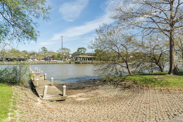 water view featuring a dock