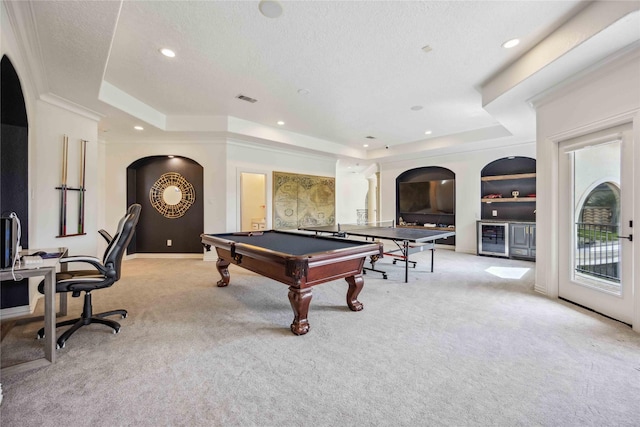 recreation room with a tray ceiling, billiards, light carpet, and visible vents