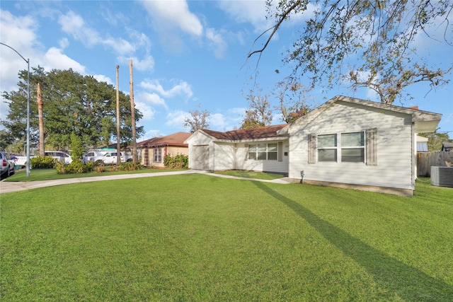 single story home featuring a front yard, fence, driveway, and central air condition unit