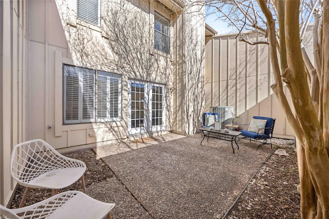 view of patio / terrace with french doors and fence