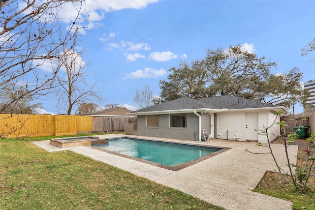 view of swimming pool with a patio, a fenced backyard, a lawn, and a pool with connected hot tub