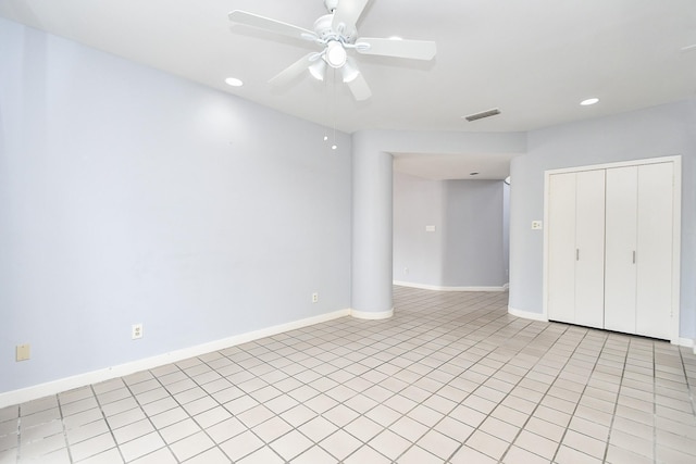 unfurnished room featuring a ceiling fan, recessed lighting, visible vents, and baseboards