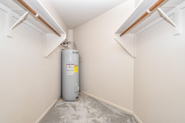 utility room with water heater