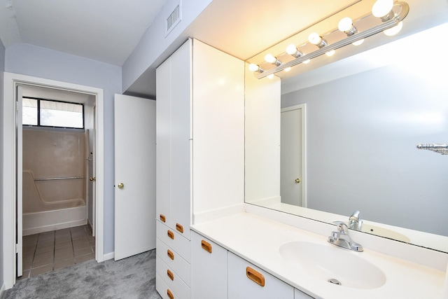 bathroom with vanity and visible vents