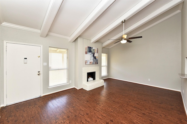 unfurnished living room with vaulted ceiling with beams, ceiling fan, a fireplace, and wood finished floors