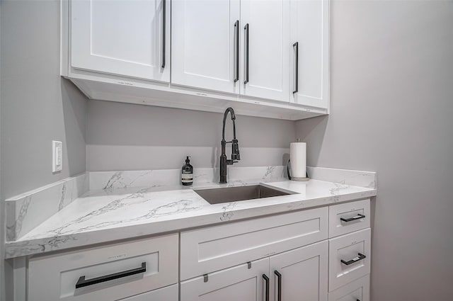 laundry room with a sink