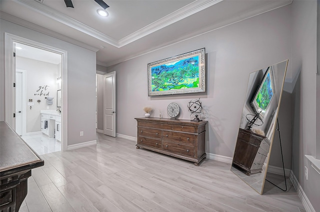 bedroom featuring crown molding, light wood finished floors, recessed lighting, ensuite bathroom, and baseboards