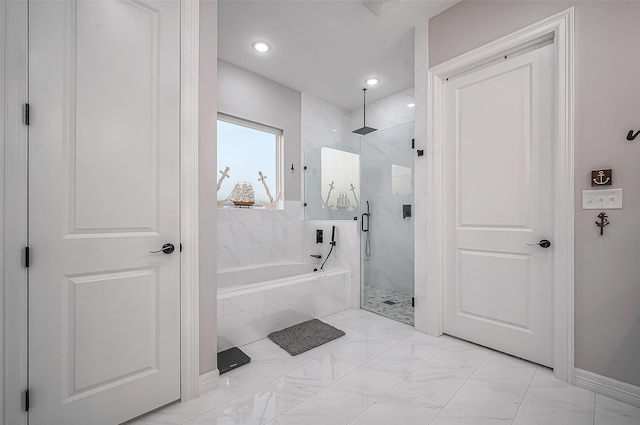 full bathroom featuring a marble finish shower, a bath, and recessed lighting