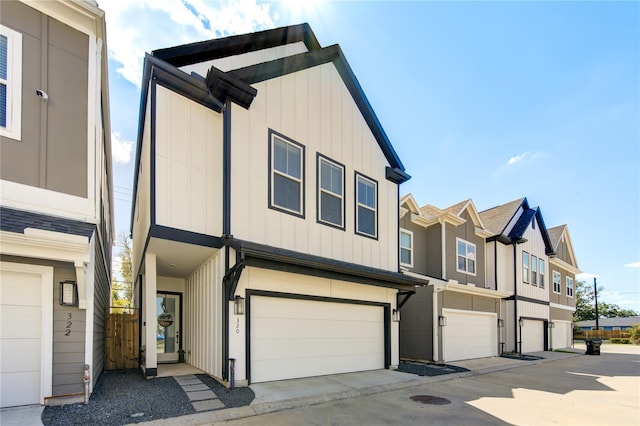 view of property featuring board and batten siding and an attached garage