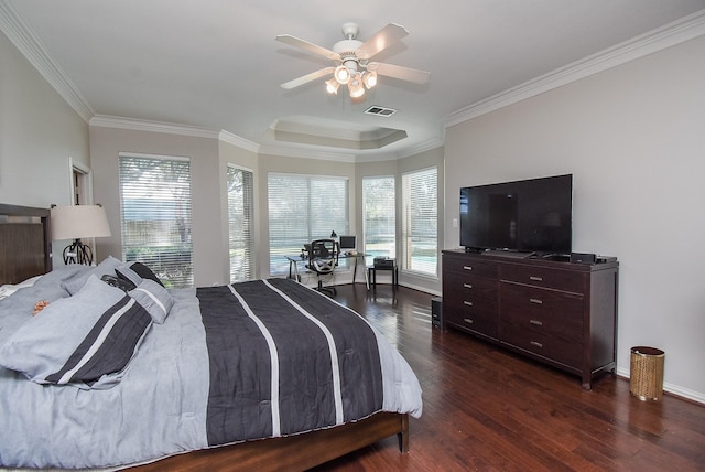 bedroom featuring ceiling fan, dark wood-type flooring, visible vents, baseboards, and ornamental molding