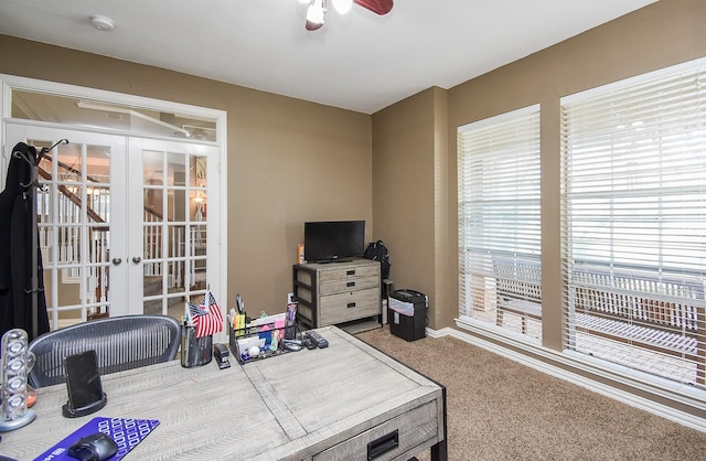 office space with carpet, ceiling fan, and french doors