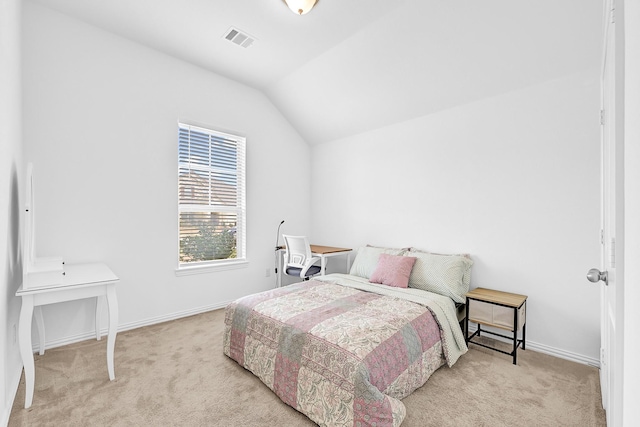 carpeted bedroom with visible vents, lofted ceiling, and baseboards