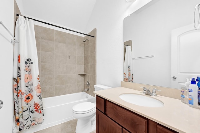 full bath with tile patterned floors, vanity, toilet, and shower / tub combo