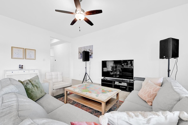 living room featuring ceiling fan