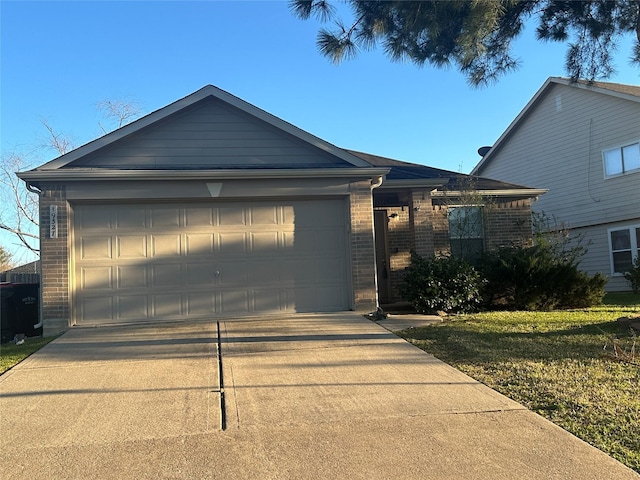 ranch-style house featuring driveway, a garage, and brick siding